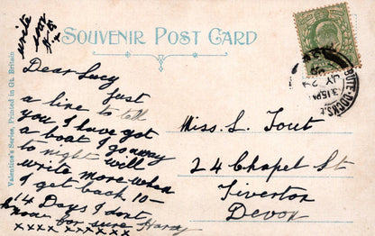 Vintage postcard with handwritten text, postage stamp, and postmark.