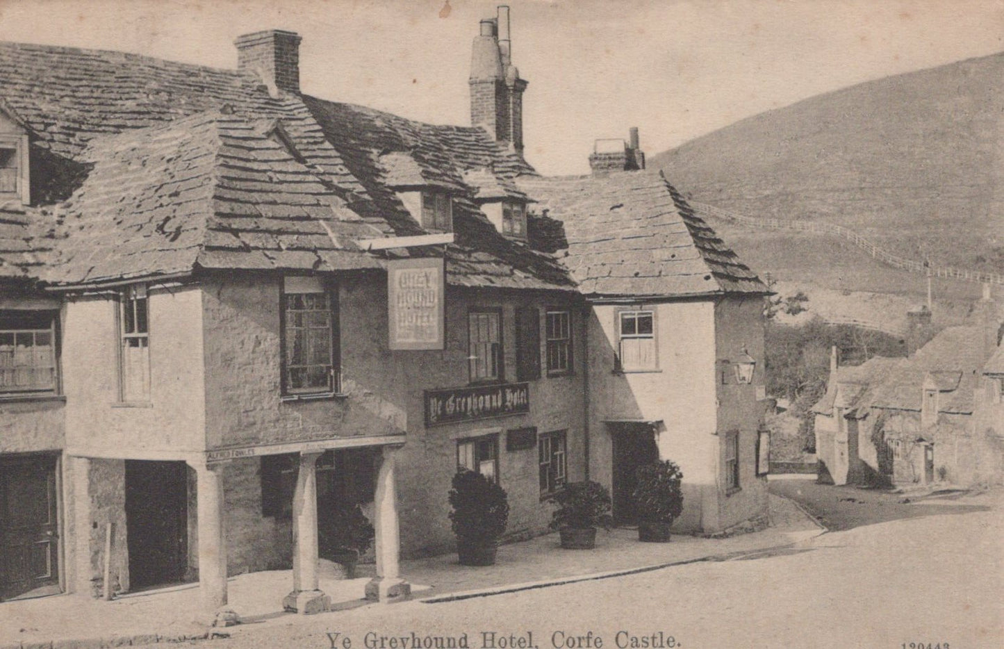 Vintage black and white photo of Ye Greyhound Hotel in Corte Castle