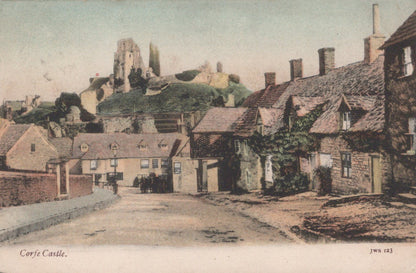 Vintage-style image of Corfe Castle with stone cottages and castle ruins.