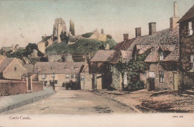 Vintage-style image of Corfe Castle with stone cottages and castle ruins.