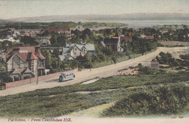 Vintage postcard of Parkstone from Constitution Hill with houses and a road.