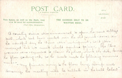Vintage postcard with handwritten text on a light brown background