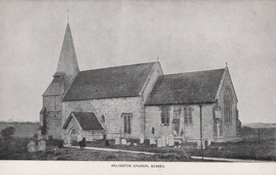 Vintage black and white photograph of a church with a steeple in a rural setting.