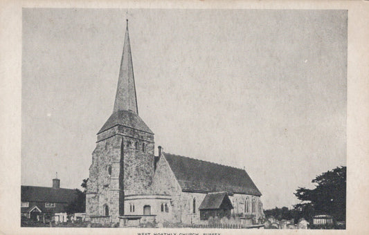 Vintage photograph of a church with a prominent steeple.