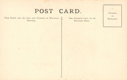 Vintage postcard with printed text and a stamp on a beige background