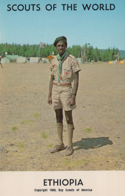 Scout in uniform standing in a field with 'Scouts of the World' and 'Ethiopia' text at the top.