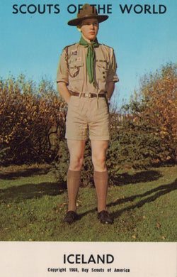 Scout in uniform with 'Scouts of the World' and 'Iceland' text on a blue sky background
