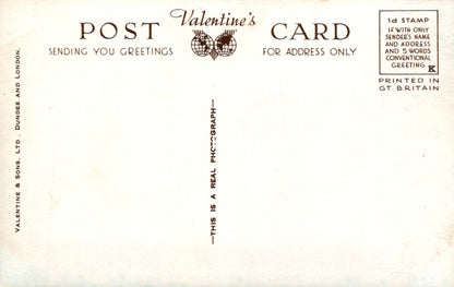 Vintage Valentine's Day card with text and a stamp design on a white background