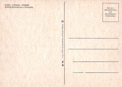 Back of a postcard from Vienna with text and design elements.