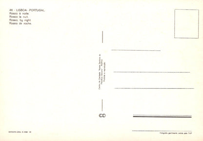 Back of a postcard from Lisbon, Portugal with text and design elements.