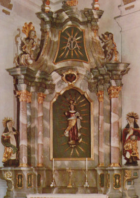 Decorative altar with religious iconography and gold embellishments