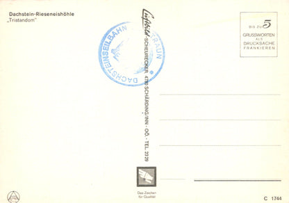 Postcard with a scenic view of Dachstein-Rieseneishole, featuring a stamp and text.
