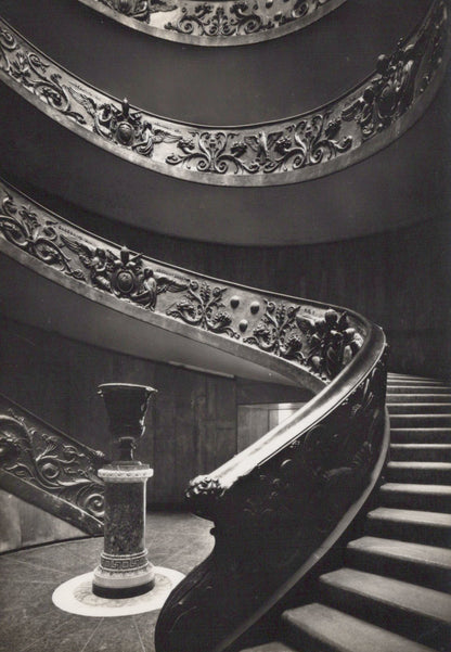 Spiral staircase with decorative balustrade in black and white