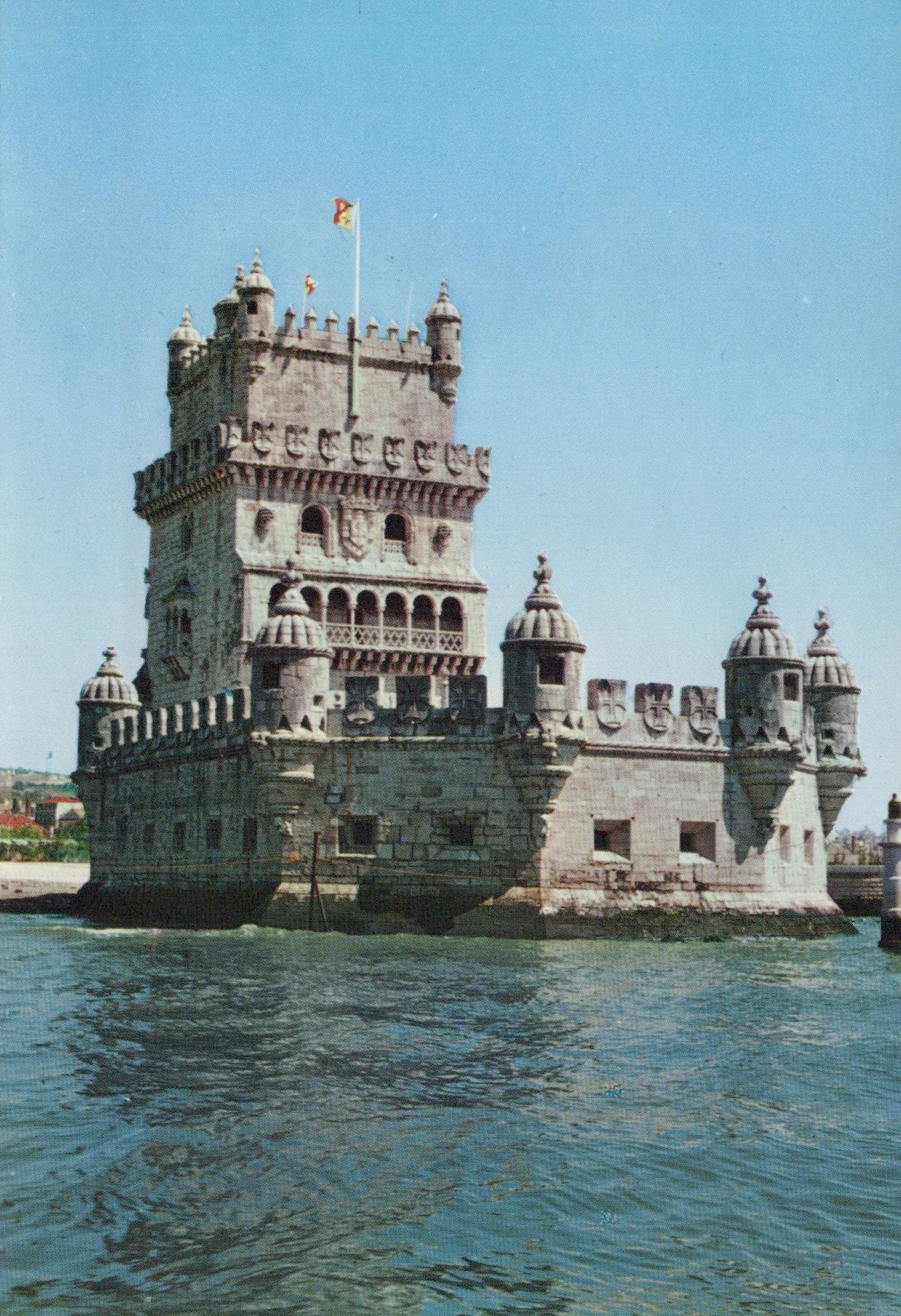 Belem Tower in Lisbon, Portugal, with a clear blue sky.