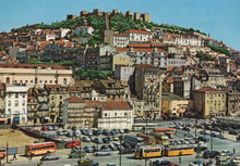 Load image into Gallery viewer, Cityscape with historical castle on a hill, buildings, and vehicles on a street.
