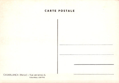 Blank postcard with 'CARTE POSTALE' text and an aerial view of Casablanca, Morocco.