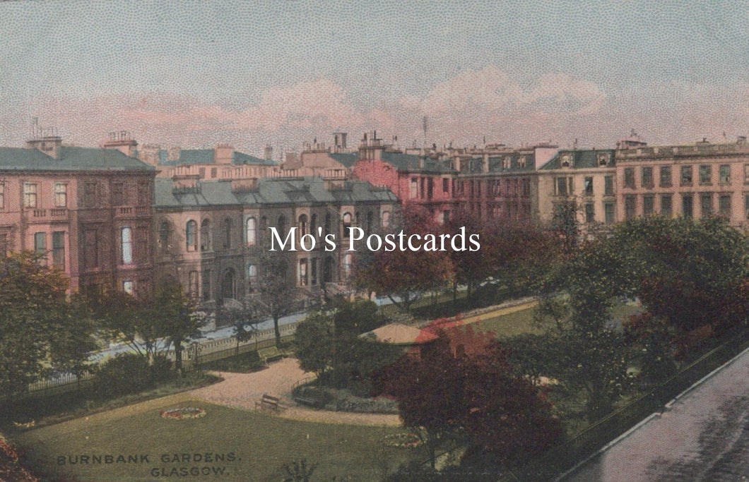 Vintage-style image of a cityscape with buildings and gardens, labeled 'Mo's Postcards'.
