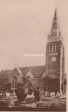 Load image into Gallery viewer, Vintage photograph of a church with a tall steeple, labeled &#39;Mo&#39;s Postcards&#39;.

