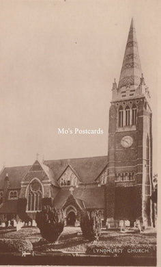 Vintage photograph of a church with a tall steeple, labeled 'Mo's Postcards'.