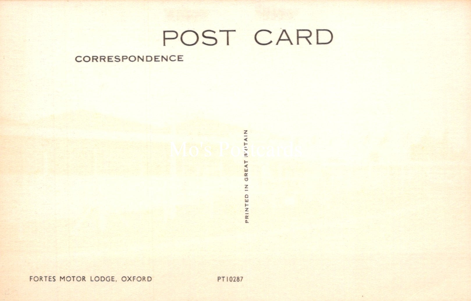 Back of a postcard with 'Post Card Correspondence' text and a blurred background.