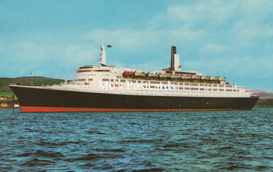 Cruise ship on water with a clear sky