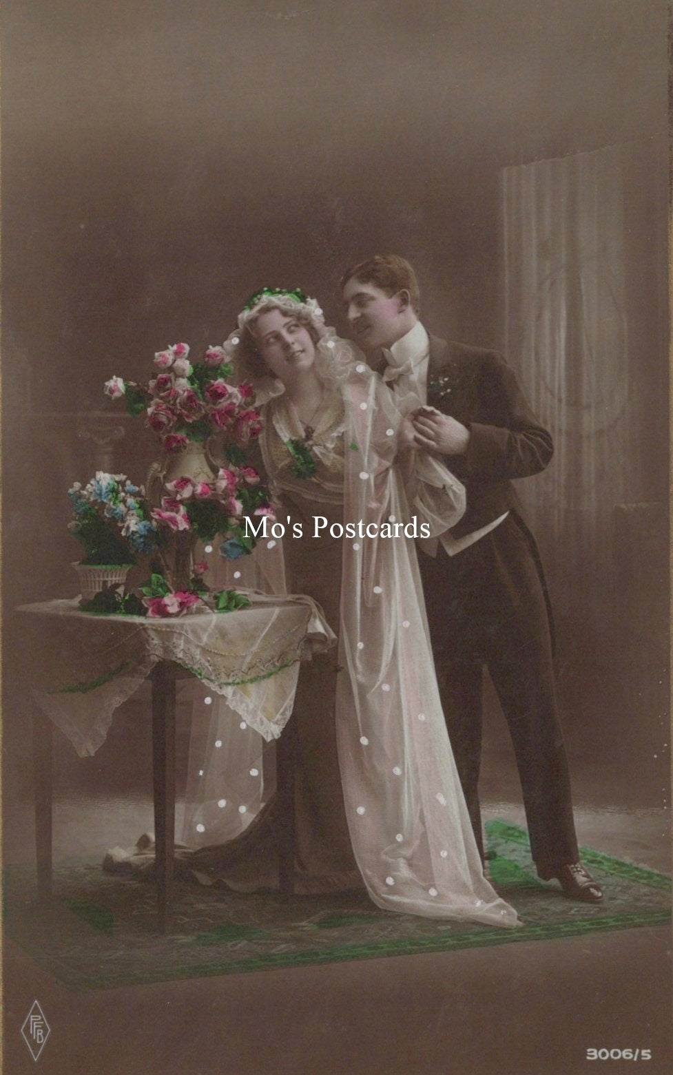 Vintage-style postcard of a couple with flowers and a tablecloth.