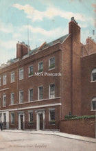 Load image into Gallery viewer, Vintage postcard of a brick building in London  
