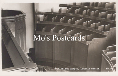 Black and white photo of church pews in a chapel with 'Mo's Postcards' text overlay.