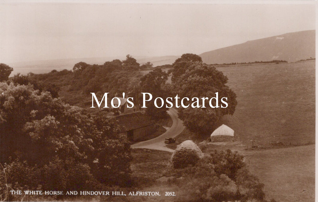 Sepia-toned postcard with a landscape view  