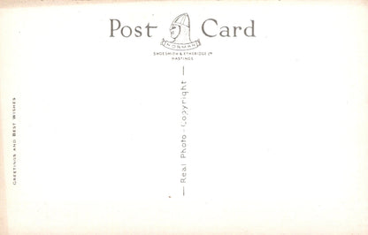 Postcard with 'Post Card' branding and a logo on a light background