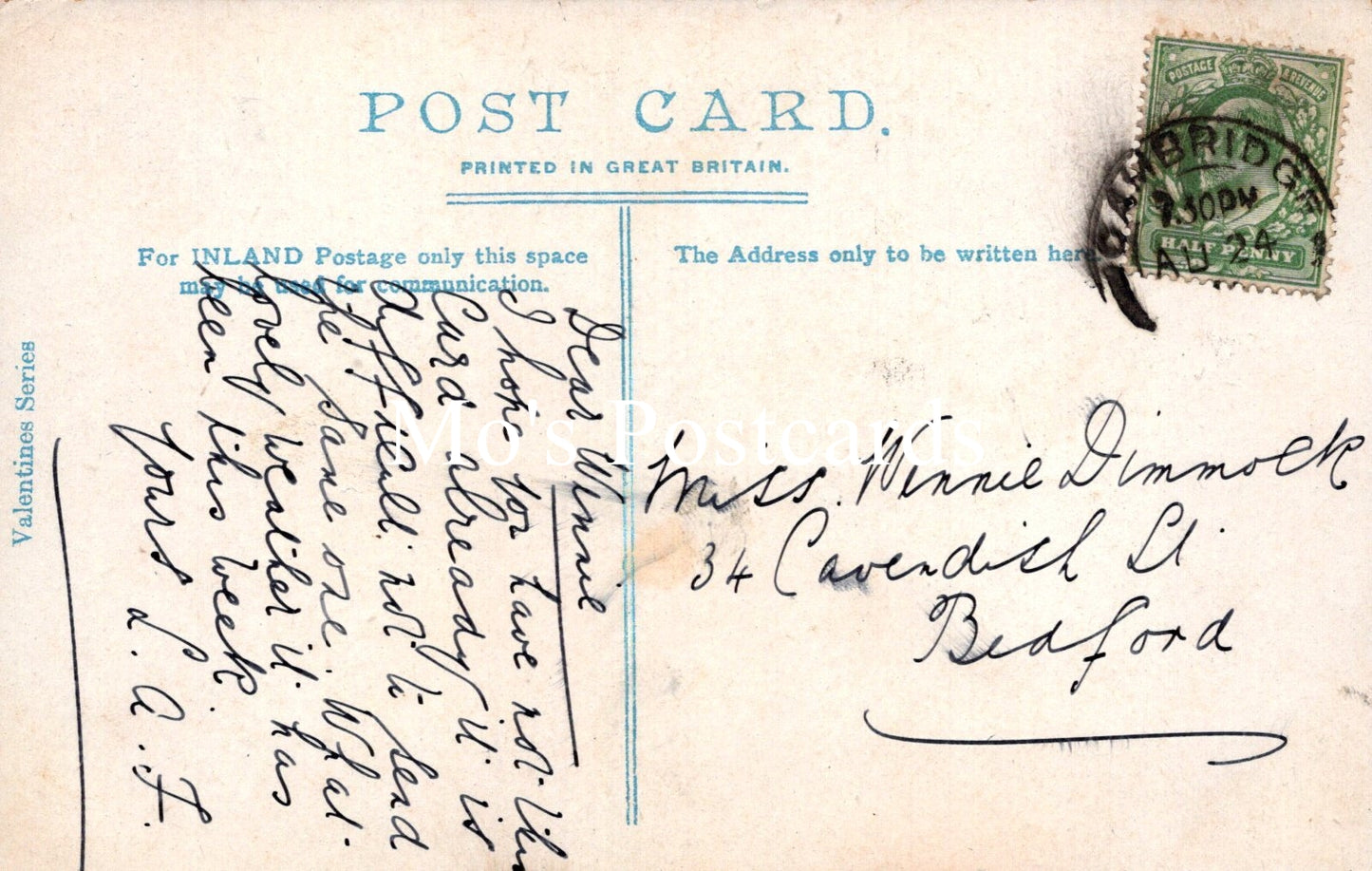Vintage postcard with handwritten text and a stamp, printed in Great Britain.