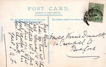 Vintage postcard with handwritten text and a stamp, printed in Great Britain.