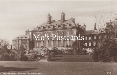 Vintage black and white photograph of a large building 