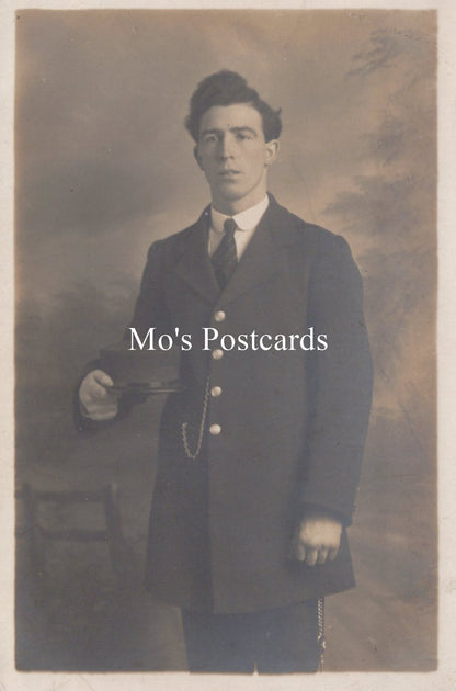 Vintage sepia-toned portrait of a man in formal attire  