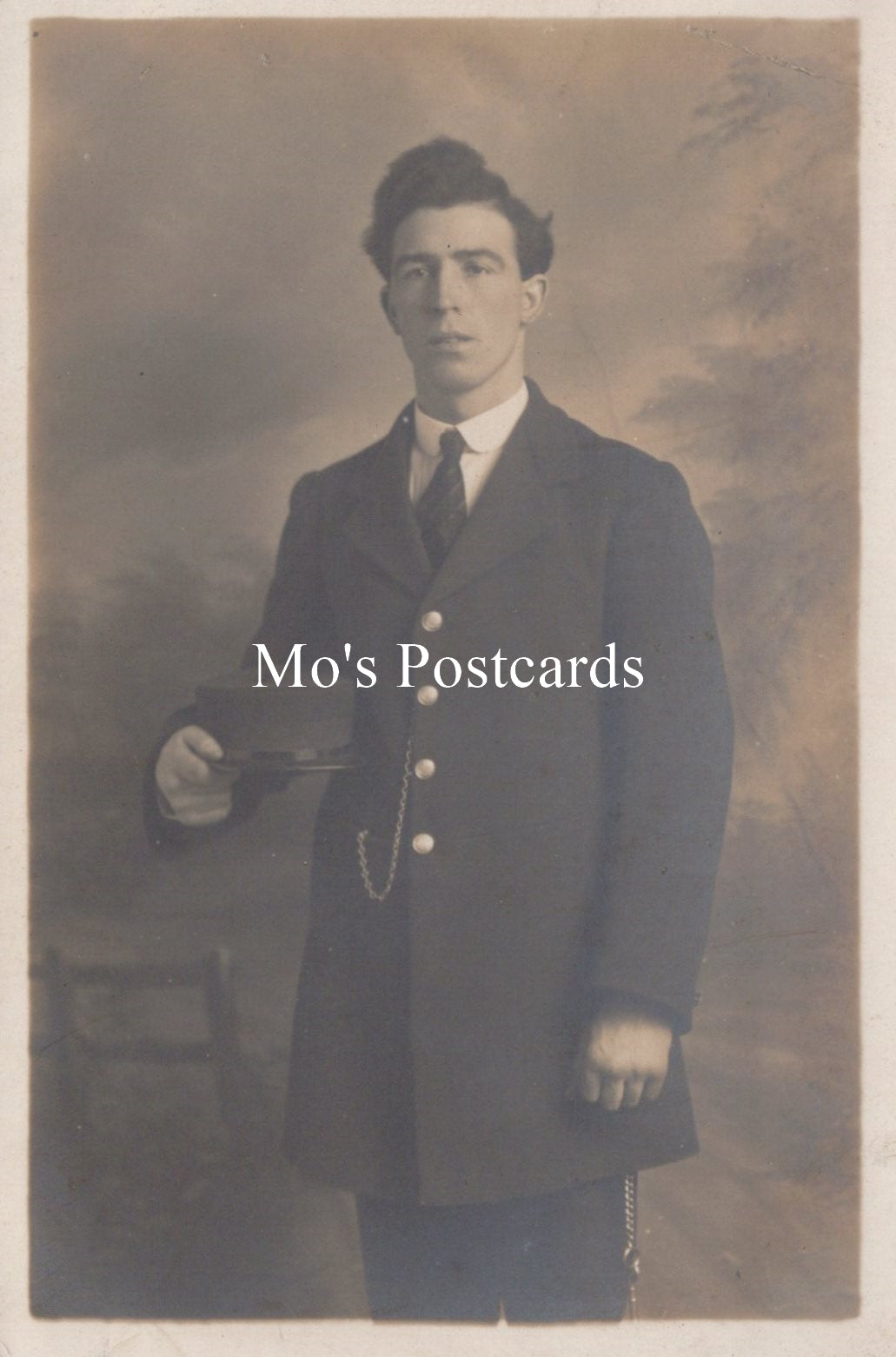 Vintage sepia-toned portrait of a man in formal attire  