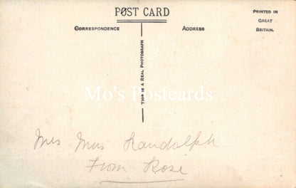 Vintage postcard with typewritten text and signature 