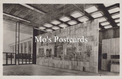 Vintage interior of a building with large wall murals  