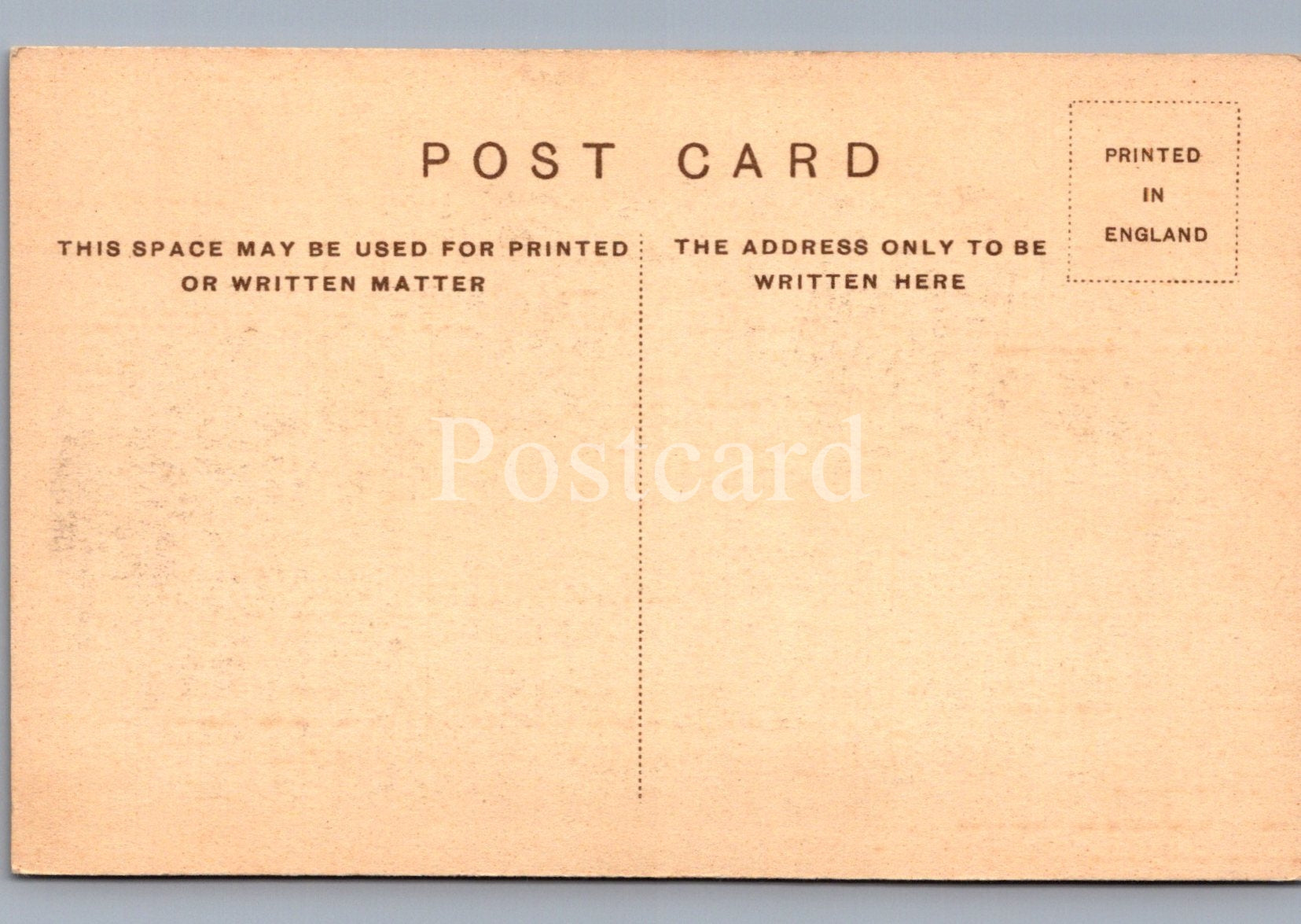 Back of a postcard with printed text on a beige background