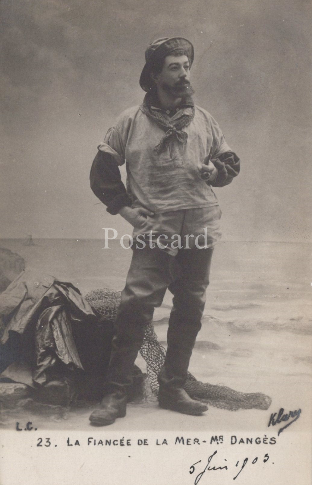 Vintage postcard of a man in a fishing outfit with text and signature
