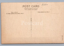 Load image into Gallery viewer, Back of a vintage postcard with text and a grid for address.

