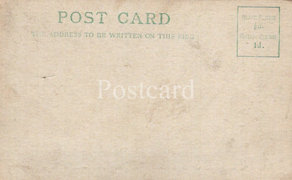 Vintage-style postcard with text and a stamp on a beige background