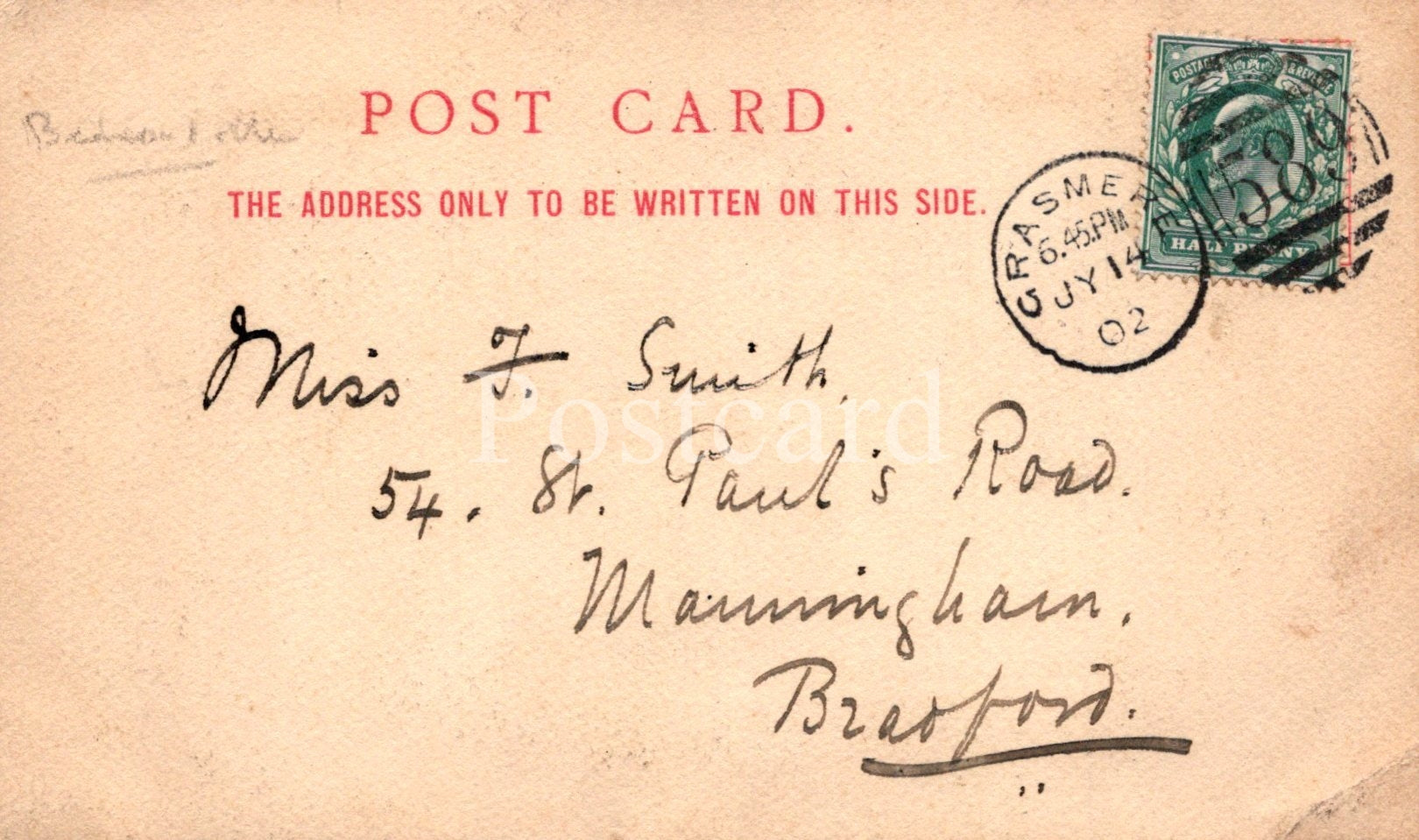 Vintage postcard with text and stamp, featuring a handwritten address.