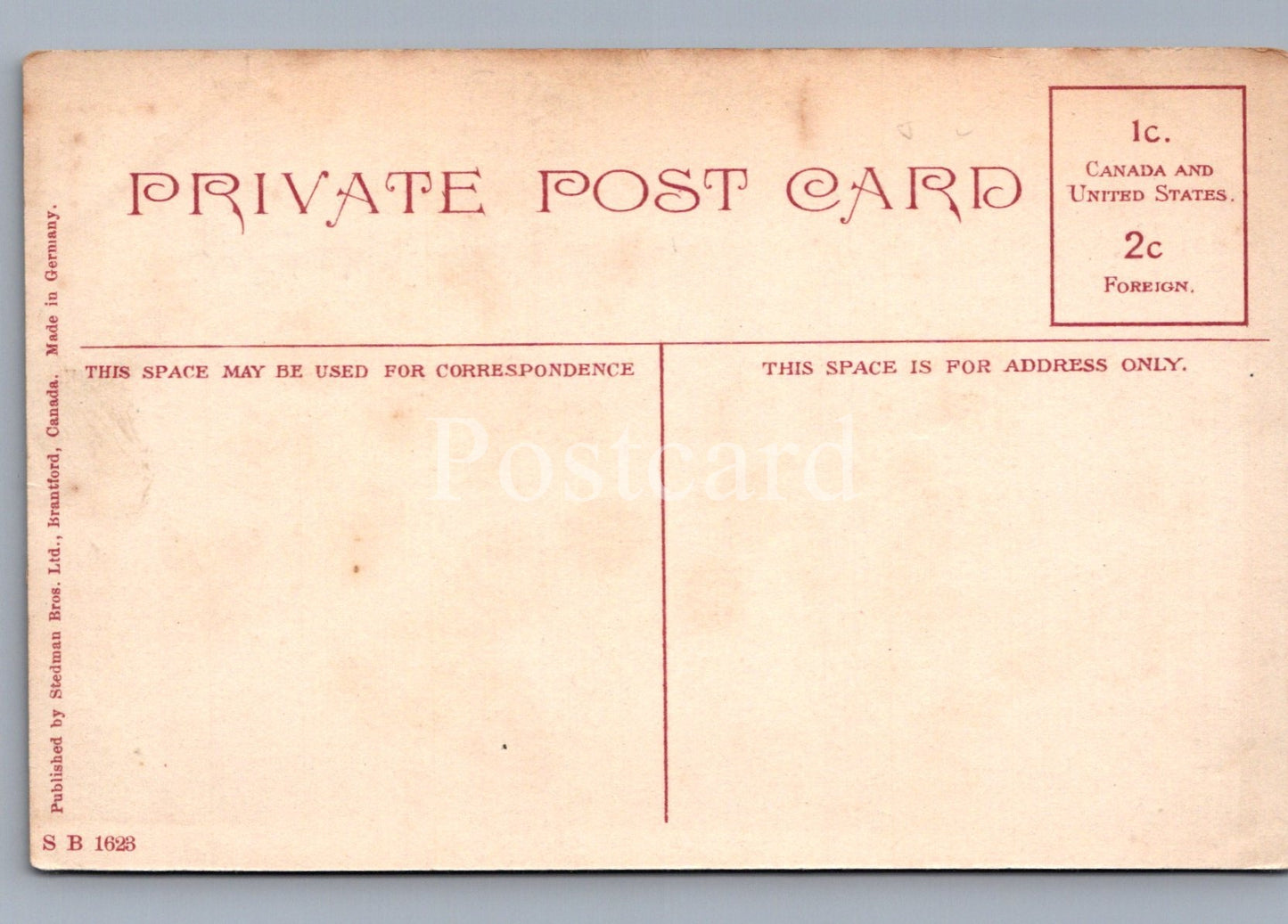 Back of a vintage postcard with red text on a beige background