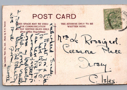 Vintage postcard with handwritten text and a stamp, featuring a message to 'Mr. de Rossignol'.