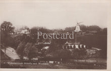 Load image into Gallery viewer, Vintage black and white postcard of Willesborough Schools and Windmill
