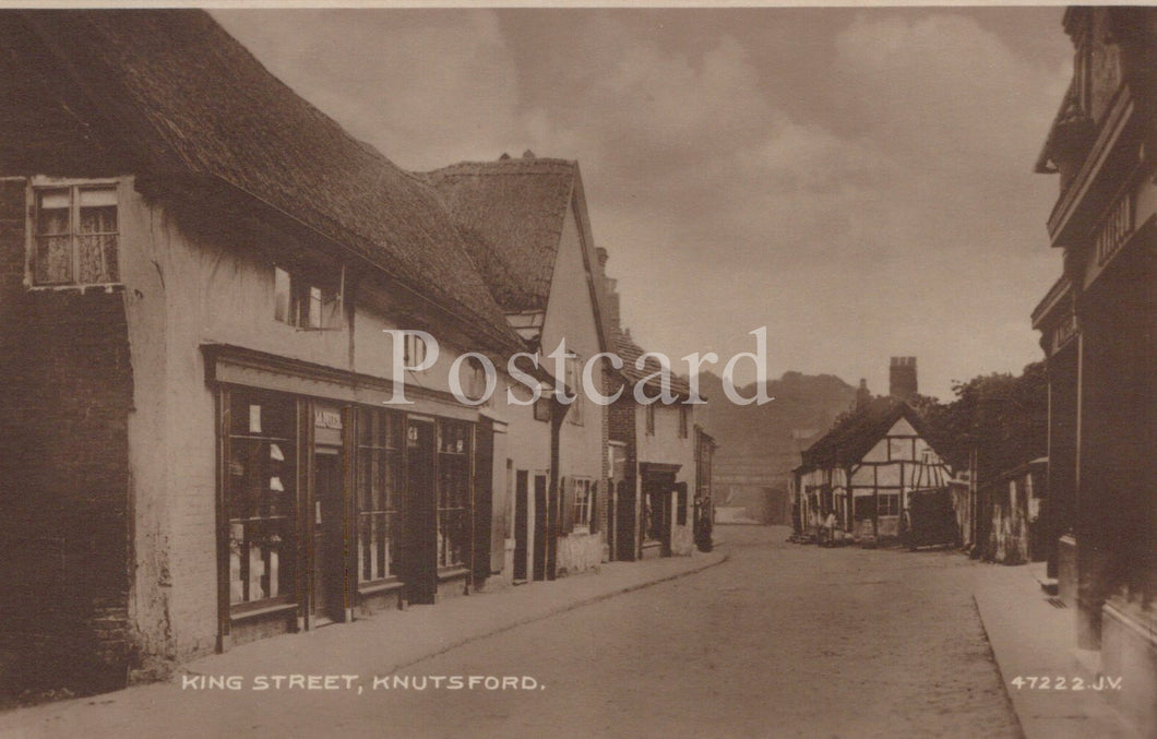 Vintage sepia-toned postcard of King Street, Knutsford with buildings on either side.