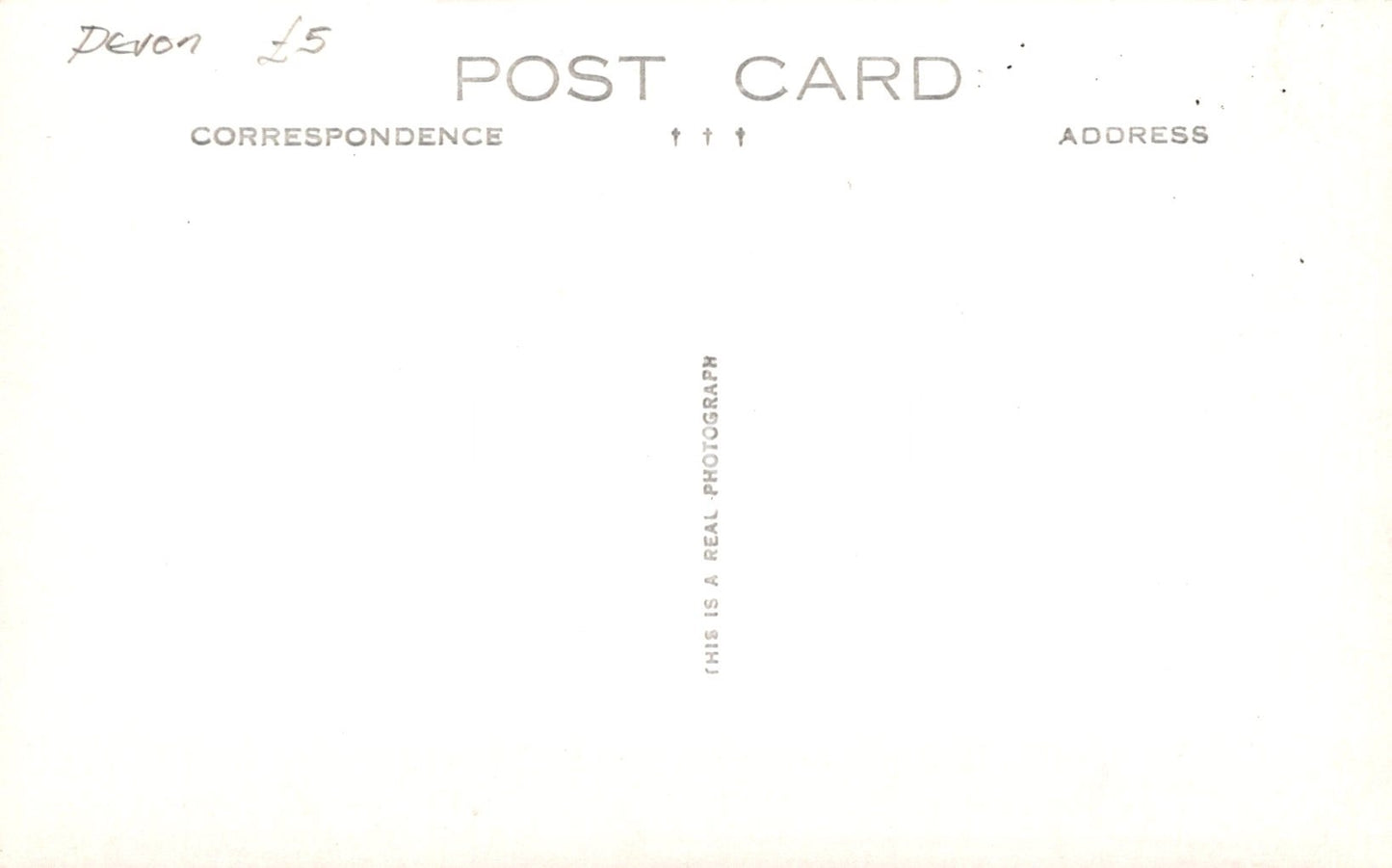 Placeholder postcard with text 'This is a real photograph' on a white background