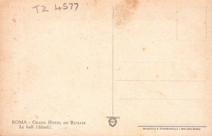 Vintage postcard with text and a small emblem on a beige background