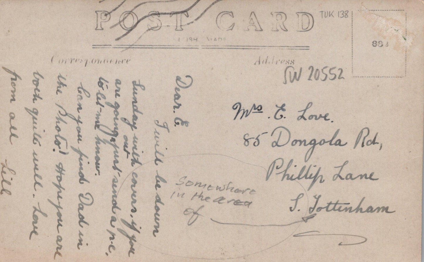 Vintage postcard with handwritten text on a blue background