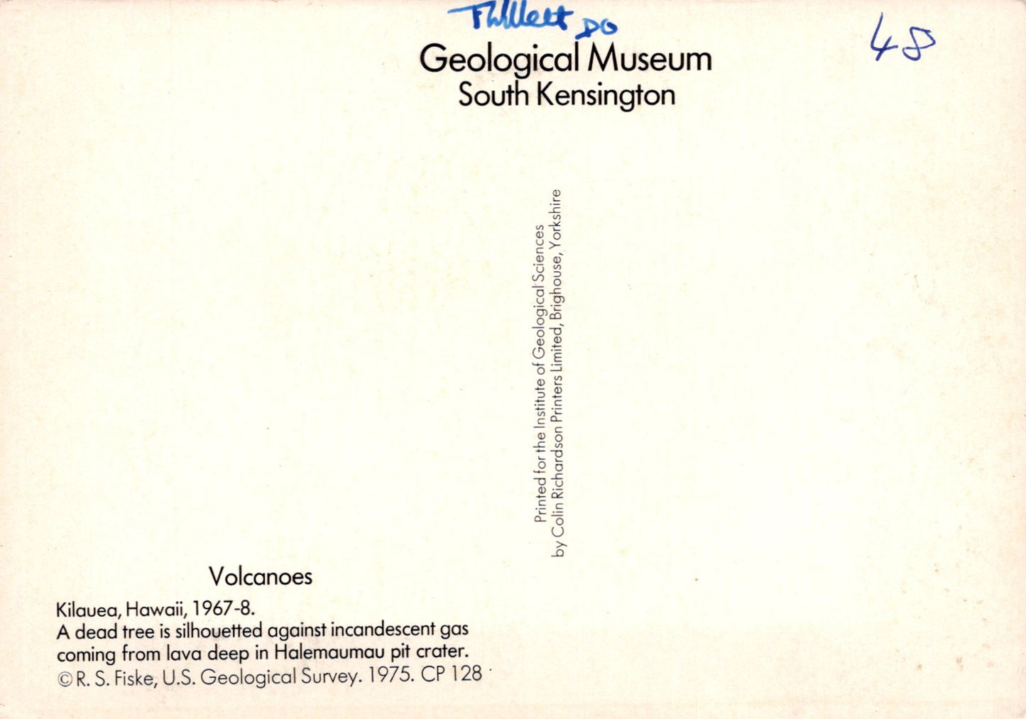 Label from Geological Museum South Kensington with text about volcanoes and a signature.